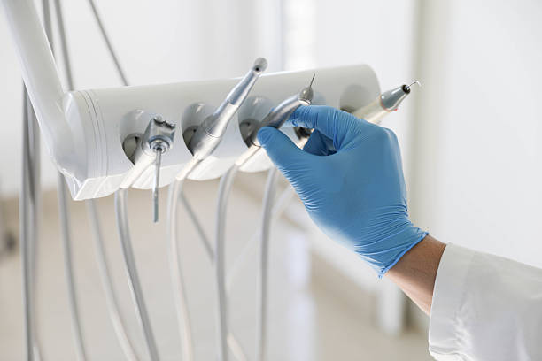 Professional Tooth Extraction technician working in Cedar Lake, IN